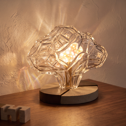 Front view of clear textured flower lampshade and warm illuminated center